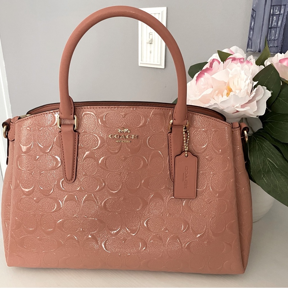 NWOT Coach pocketbook.